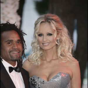 Christian Karembeu and his wife Adriana arrive at the 62nd Red Cross Ball at the Sporting Club Salle des Etoiles in Monaco, 30 July 2010.