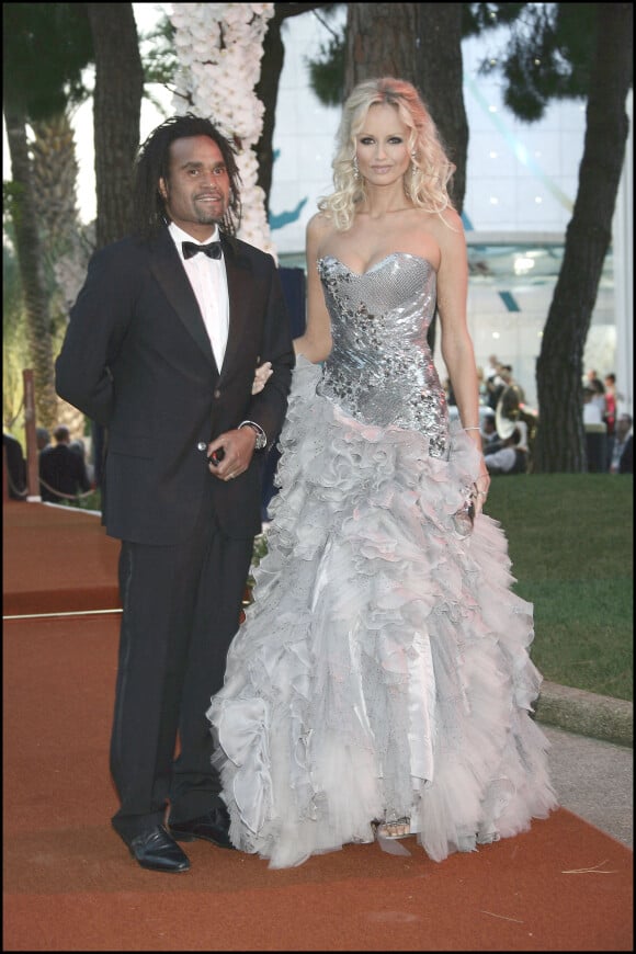 Christian Karembeu and his wife Adriana arrive at the 62nd Red Cross Ball at the Sporting Club Salle des Etoiles in Monaco, 30 July 2010.