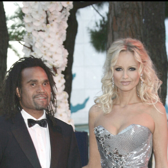 Christian Karembeu and his wife Adriana arrive at the 62nd Red Cross Ball at the Sporting Club Salle des Etoiles in Monaco, 30 July 2010.