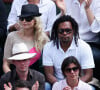 Archives - Christian Karembeu et sa femme Adriana Karembeu lors de la finale du tournoi de tennis de Roland Garros à Paris.