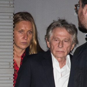 Anne Hommel - Roman Polanski et sa femme Emmanuelle Seigner quittent l'avant-première du film "J'accuse" au cinéma UGC Normandie entourés de 5 gardes du corps à Paris le 12 novembre 2019.