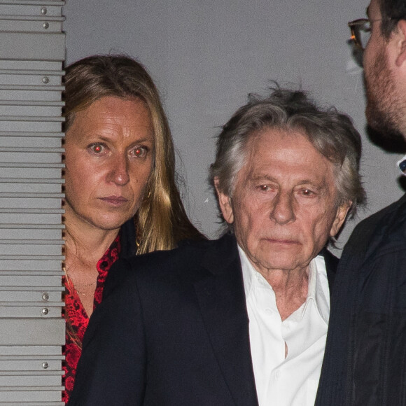 Anne Hommel - Roman Polanski et sa femme Emmanuelle Seigner quittent l'avant-première du film "J'accuse" au cinéma UGC Normandie entourés de 5 gardes du corps à Paris le 12 novembre 2019.