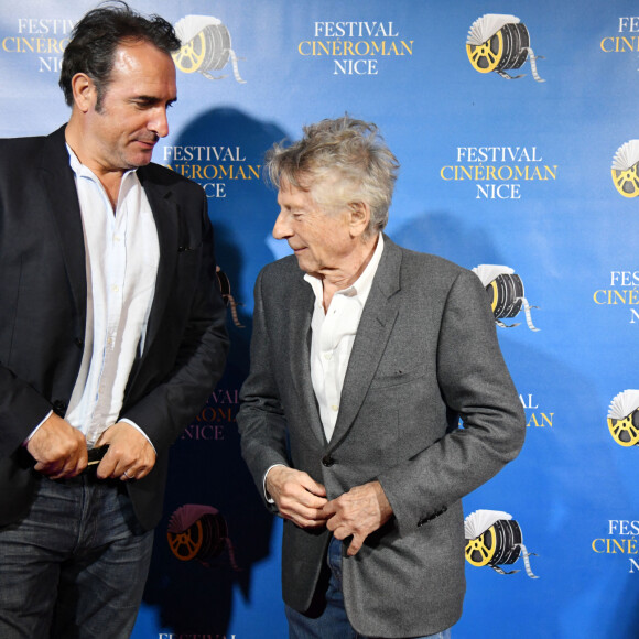 Jean Dujardin et Roman Polanski durant la soirée de clôture de la 1ere édition du Festival Ciné Roman à Nice le 26 octobre 2019.  © Bruno Bebert / Bestimage 