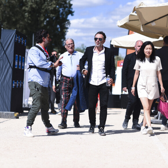 Exclusif - Yann Moix et sa compagne Akiko Suwanai - Festival des Livres et des Artistes organisé par l'association "Lecture pour Tous" engagée dans la lutte contre l'illettrisme au Mail Branly à Paris le 3 juillet 2022. © Pierre Perusseau / Jack Tribeca / Bestimage 