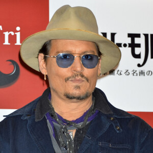 Johnny Depp pose lors du photocall du film "Charlie Mortdecai" à Tokyo, le 28 janvier 2015. 