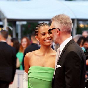 Tina Kunakey et son mari Vincent Cassel - Montée des marches du film " Les crimes du futur " lors du 75ème Festival International du Film de Cannes. Le 23 mai 2022 © Dominique Jacovides / Bestimage 