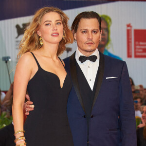 Johnny Depp et sa femme Amber Heard - Tapis rouge du film Black Mass (Strictly Criminal) lors du 72ème festival du film de Venise (la Mostra), le 4 septembre 2015.