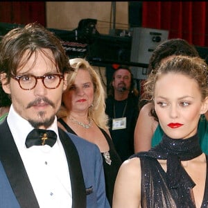 Johnny Depp et Vanessa Paradis arrivent ) la soirée Vanity Fair après la cérémonie des Oscars e 2005.
