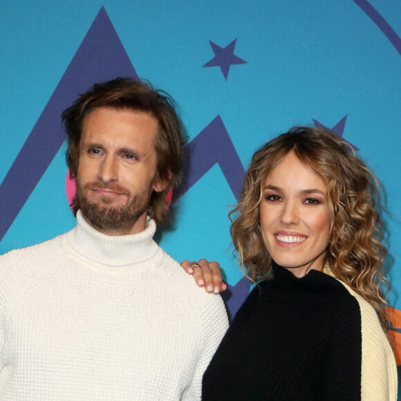 Philippe Lacheau et Elodie Fontan au photocall de la soirée d'ouverture de la 25ème édition du Festival international du film de comédie de l'Alpe d'Huez le 17 janvier 2022. © Dominique Jacovides / Bestimage 