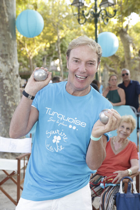 Tony Gomez lors d'un tournoi de pétanque place des Lices organisé par le magazine Turquoise pour l'association Sourire à la vie à Saint-Tropez le 10 août 2022. © Jack Tribeca / Bestimage