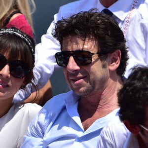 Patrick Bruel et Caroline Nielsen - People dans les tribunes lors de la demi-finale des Internationaux de tennis de Roland-Garros à Paris, le 5 juin 2015. 