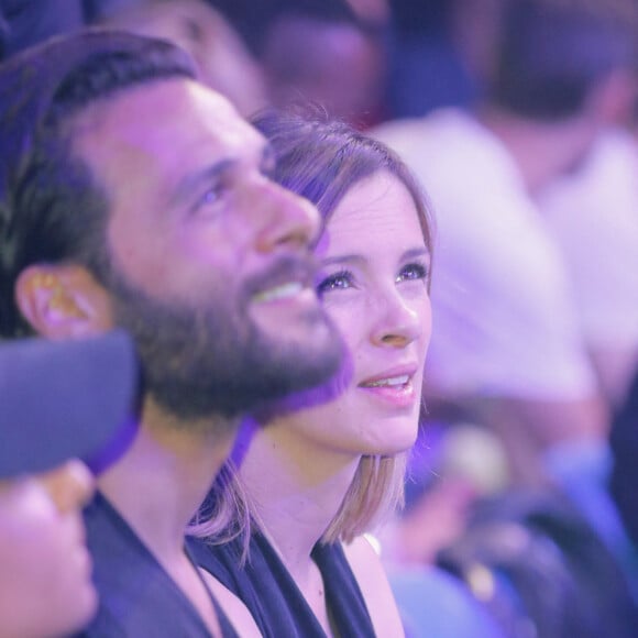 Maxim Nucci (Yodelice) et sa compagne enceinte Isabelle Ithurburu - Maxim Nucci (Yodelice) et sa compagne enceinte Isabelle Ithurburu assistent au match de boxe de Tony Yoka au palais des sports de Paris, le 23 juin 2018 © Veeren-CVS/Bestimage