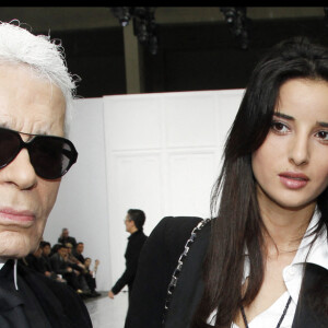 Jean-Luc Delarue et son épouse Anissa Khel, et Karl Lagerfeld – people au défilé Dior hommes à Paris en janvier 2012