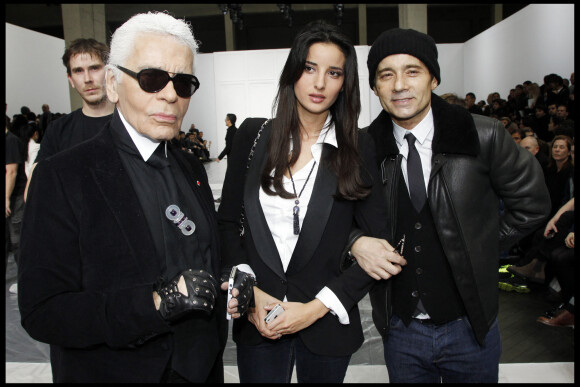 Jean-Luc Delarue et son épouse Anissa Khel, et Karl Lagerfeld – people au défilé Dior hommes à Paris en janvier 2012