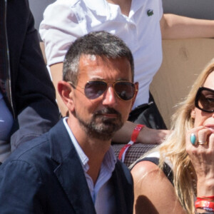 Guillaume Robert, Estelle Lefebure - Les célébrités en tribune lors des internationaux de France de Roland Garros à Paris le 24 mai 2022.