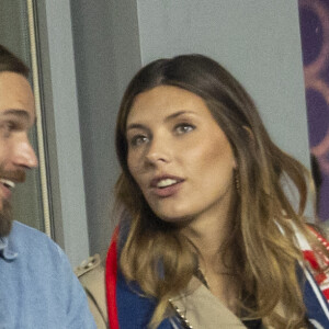 Camille Cerf (Miss France 2015) et son compagnon Théo Fleury - People dans les tribunes lors du match de la 5ème et avant-dernière journée de Ligue des nations entre la France et l'Autriche (2-0) au Stade de France à Saint-Denis le 22 septembre 2022.