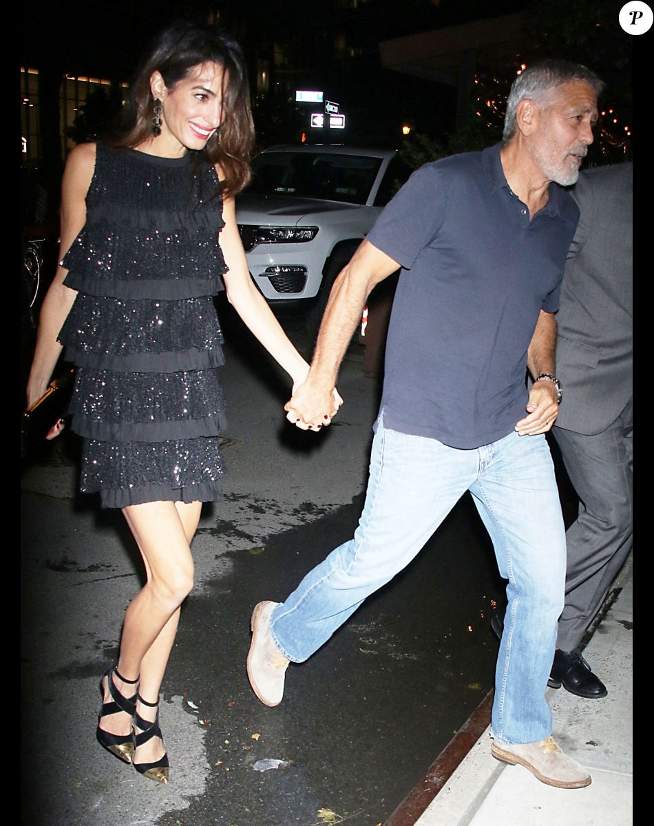 George Clooney et sa femme Amal arrivent à l'hôtel "The Whitby" à New York, le 22 septembre 2022.