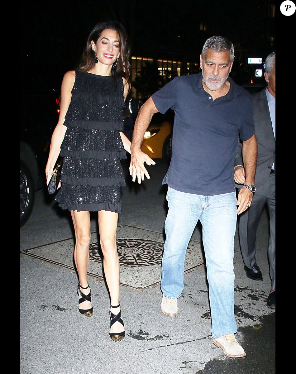 George Clooney et sa femme Amal arrivent à l'hôtel "The Whitby" à New York, le 22 septembre 2022.