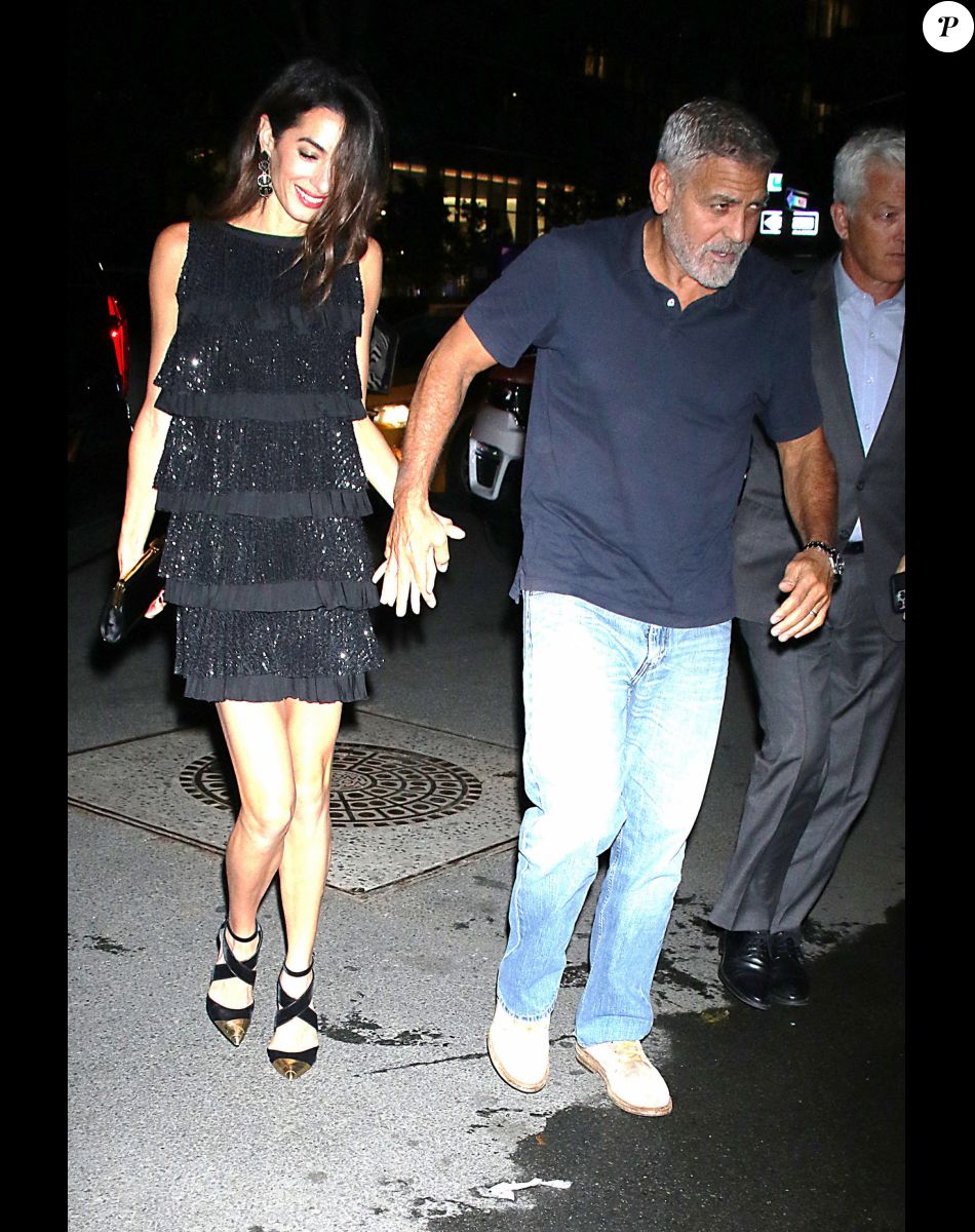 George Clooney et sa femme Amal arrivent à l'hôtel "The Whitby" à New York, le 22 septembre 2022.
