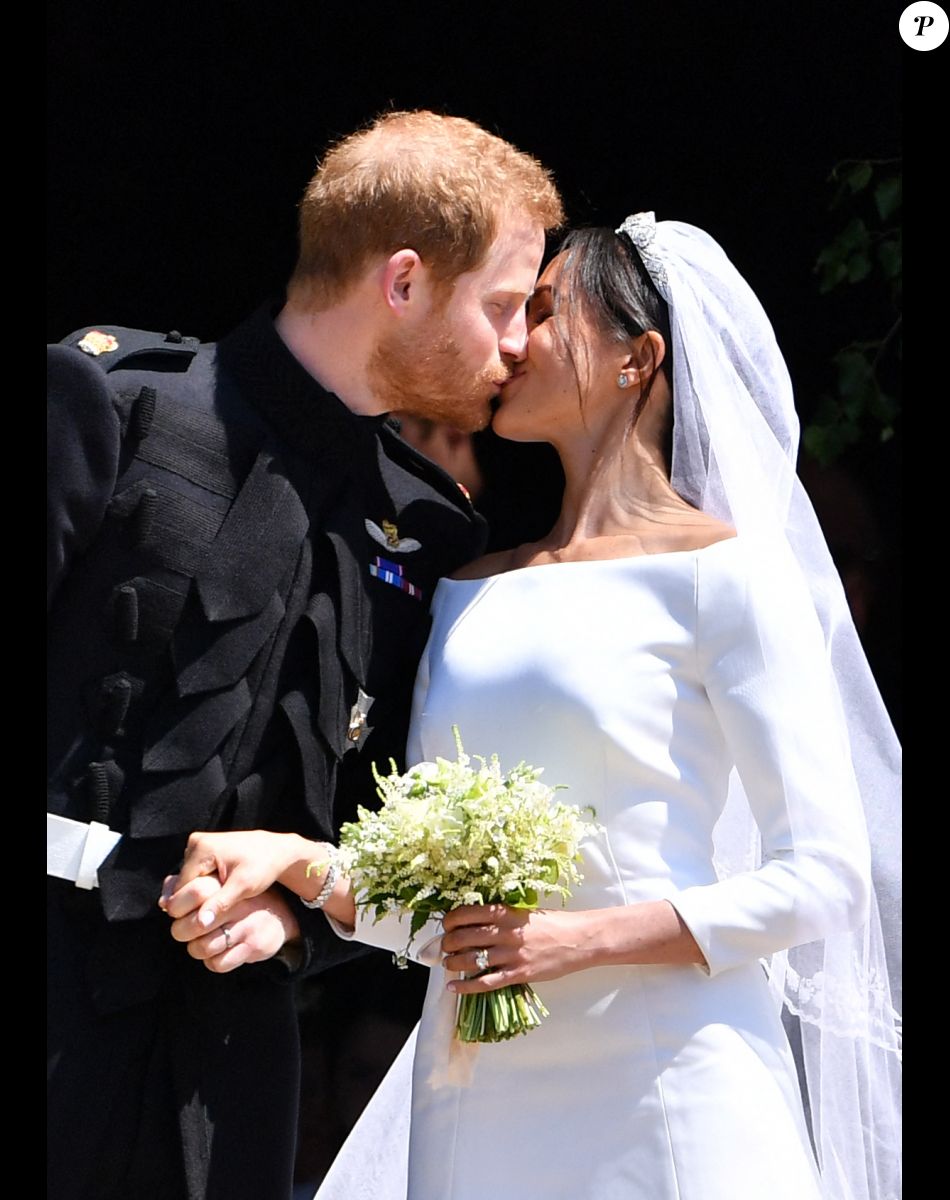 Le prince Harry, duc de Sussex, et Meghan Markle, duchesse de Sussex, à la sortie de chapelle St. George au château de Windsor - Sortie après la cérémonie de mariage du prince Harry et de Meghan Markle en la chapelle Saint-George au château de Windsor, Royaume Uni, le 19 mai 2018.