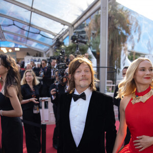 Diane Kruger et son compagnon Norman Reedus avant la montée des marches de "L'innocent" lors du 75ème Festival International du Film de Cannes, le 24 mai 2022. @ Justin Personnaz/Bestimage 