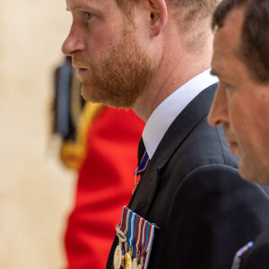 Le prince Harry, duc de Sussex - Procession pédestre des membres de la famille royale depuis la grande cour du château de Windsor (le Quadrangle) jusqu'à la Chapelle Saint-Georges, où se tiendra la cérémonie funèbre des funérailles d'Etat de reine Elizabeth II d'Angleterre. Windsor, le 19 septembre 2022 