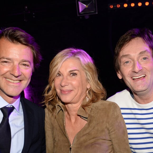 Michèle Laroque entre son compagnon François Baroin et Pierre Palmade - After-party du film Brillantissime à la discothèque L'Arc à Paris, France, le 15 janvier 2018. Evènement organisé par Five Eyes Production. © Rachid Bellak/Bestimage.