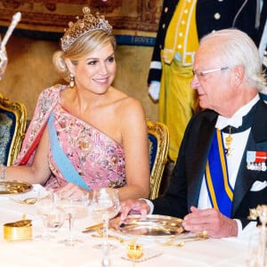 La reine Maxima des Pays-Bas, le roi Carl Gustav de Suède - Banquet d'état au palais royal de Stockholm en l'honneur de la famille royale des Pays-Bas le le 11 octobre 2022. 