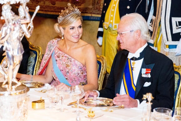 La reine Maxima des Pays-Bas, le roi Carl Gustav de Suède - Banquet d'état au palais royal de Stockholm en l'honneur de la famille royale des Pays-Bas le le 11 octobre 2022. 