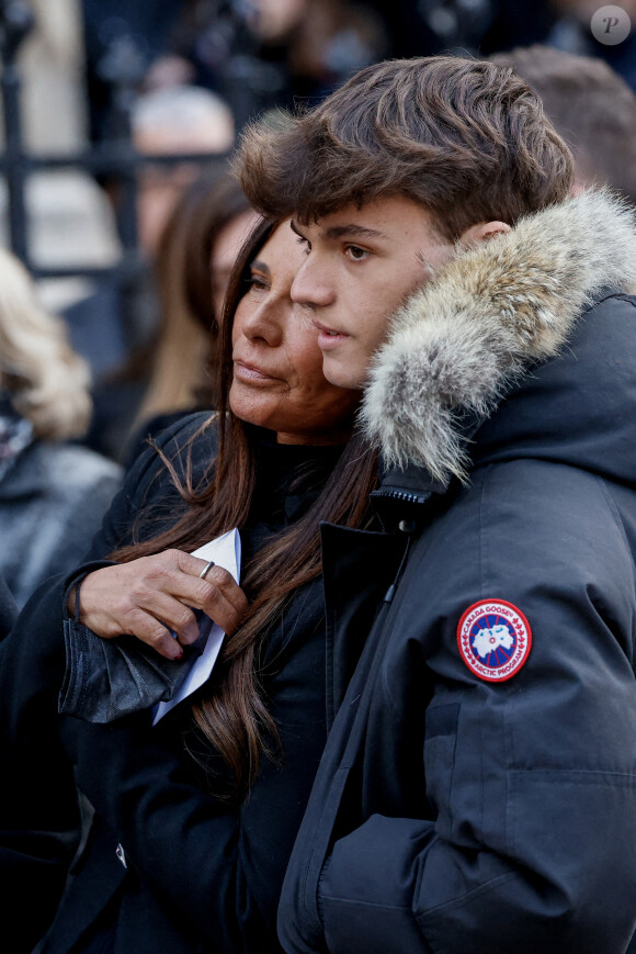 Nathalie Marquay et son fils Tom - La famille de Jean-Pierre Pernaut à la sortie des obsèques en la Basilique Sainte-Clotilde à Paris le 9 mars 2022. © Cyril Moreau/Bestimage.