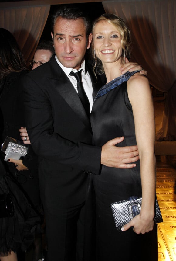 Alexandra Lamy et Jean Dujardin à la soirée au Fouquet's des César en 2012