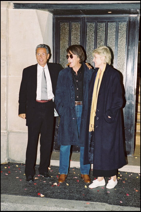 Jean-Marie Périer avec Françoise Hardy et Jacques Dutronc au mariage de Michel Sardou et d'Anne-Marie Périer à Neuilly en 1999