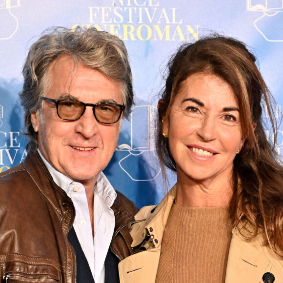 François Cluzet et sa femme Narjiss Slaoui-Falcoz au photocall de la soirée du 8 octobre lors de la 4ème édition du festival Cinéroman à Nice. © Bruno Bebert / Bestimage 