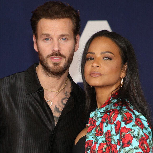 Matt Pokora et sa femme Christina Milian au photocall lors de la première du film "Ambulance" à Los Angeles 
