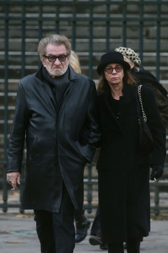 Eddy Mitchell et sa femme Muriel - Sorties de l'église de la Madeleine après les obsèques de Johnny Hallyday à Paris - Le 9 décembre 2017.