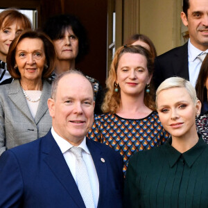 Le prince Albert II de Monaco et la princesse Charlene en compagnie de Camille Gottlieb ont remis les traditionnels paquets cadeaux de la Croix Rouge monégasque dans le cadre des festivités liées à la Fête Nationale, le 16 novembre 2022. © Bruno Bebert/Bestimage 