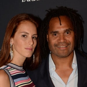 Christian Karembeu et sa femme Jackie Chamoun - A l'occasion des 20 ans de la victoire de l'équipe de France, les bleus 98 se sont rendus à un dîner organisé au Buddha Bar avec tous les joueurs et leur famille. © Rachid Bellak/Bestimage