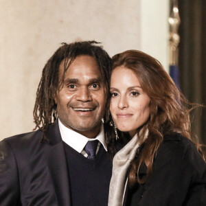 L'ancien footballeur français Christian Karembeu et sa femme Jacky Chamoun - Dîner au Palais de l'Elysée en l'honneur des 50 ans du Variétés Club de France, à Paris, le 14 octobre 2021. © Stéphane Lemouton / Bestimage