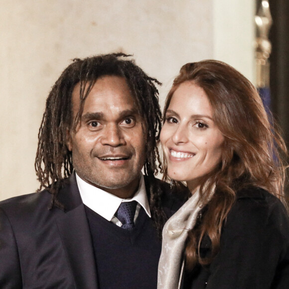 L'ancien footballeur français Christian Karembeu et sa femme Jacky Chamoun - Dîner au Palais de l'Elysée en l'honneur des 50 ans du Variétés Club de France, à Paris, le 14 octobre 2021. © Stéphane Lemouton / Bestimage