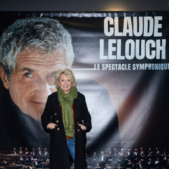 Exclusif - Sophie Davant - Photocall - Spectacle symphonique Claude Lelouch "D'un film à l'autre" au Palais des Congrès de Paris le 14 novembre 2022. Pour Fêter ses 85 ans et 60 de carrière, Claude Lelouch a créé un ciné-concert, "Claude Lelouch - D'un film à l'autre", dans lequel la musique de ses films est jouée par l'orchestre philharmonique de Prague, au Palais des Congrès à Paris. Sur le gâteau, son chiffre fétiche : 13 car 85 ans (8+5 = 13). Claude Lelouch associe le 13 à toute sa vie professionnelle : sa société “Les films 13” et son cinéma, le “Club 13. © Moreau / Rindoff / Bestimage  Exclusive - No web en Suisse / Belgique Claude Lelouch symphonic show "D'un film à l'autre" at the Palais des Congrès in Paris on 14 November 2022. To celebrate his 85th birthday and 60 years of career, Claude Lelouch has created a cine-concert, "Claude Lelouch - D'un film à l'autre", in which the music of his films is played by the Prague Philharmonic Orchestra, at the Palais des Congrès in Paris. On the cake, his favourite number: 13 because he is 85 years old (8+5 = 13). Claude Lelouch associates 13 with his entire professional life: his company "Les films 13" and his cinema, the "Club 13. 