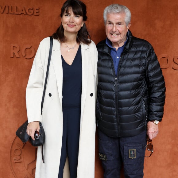 Claude Lelouch et sa compagne Valérie Perrin au village (jour 10) lors des Internationaux de France de Tennis de Roland Garros 2022 à Paris, France, le 31 mai 2022. © Dominique Jacovides/Bestimage