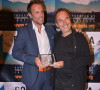 Fabrice Sopoglian reçoit deux Awards pour le documentaire "VIF" sur la vie de Christian Audigier lors du festival DOC LA à Los Angeles le 20 octobre 2017. 