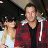 Paris Hilton et son boyfriend Doug Reinhardt, à l'aéroport LAX de Los Angeles, de retour de leur court séjour à Paris, le jeudi 11 février.