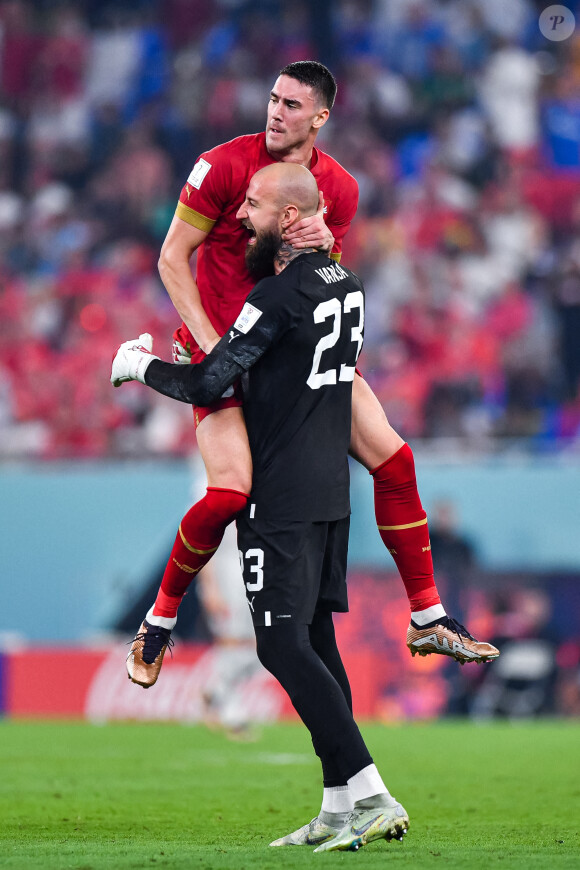 Dusan VLAHOVIC of Serbia celebrates his goal with Vanja MILINKOVIC SAVIC of Serbia during the FIFA World Cup 2022, Group G match between Switzerland and Serbia at Stadium 974 on December 2, 2022 in Doha, Qatar. (Photo by Baptiste Fernandez/Icon Sport/ABACAPRESS.COM) 