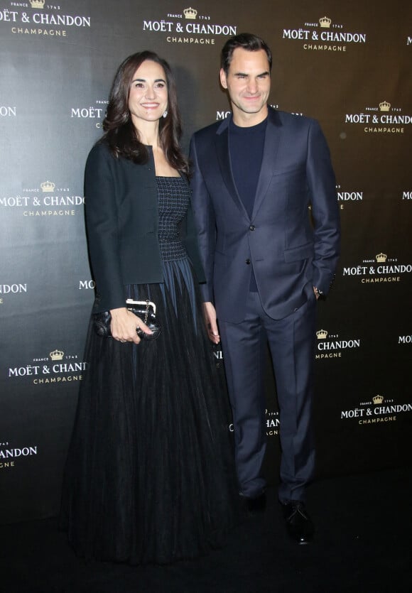 Berta de Pablos- Barbier et Roger Federer au photocall de la soirée "Moët & Chandon" à New York, le 5 décembre 2022. 