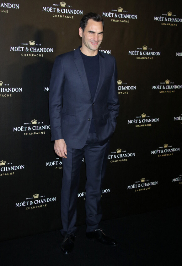 Roger Federer au photocall de la soirée "Moët & Chandon" à New York, le 5 décembre 2022. 