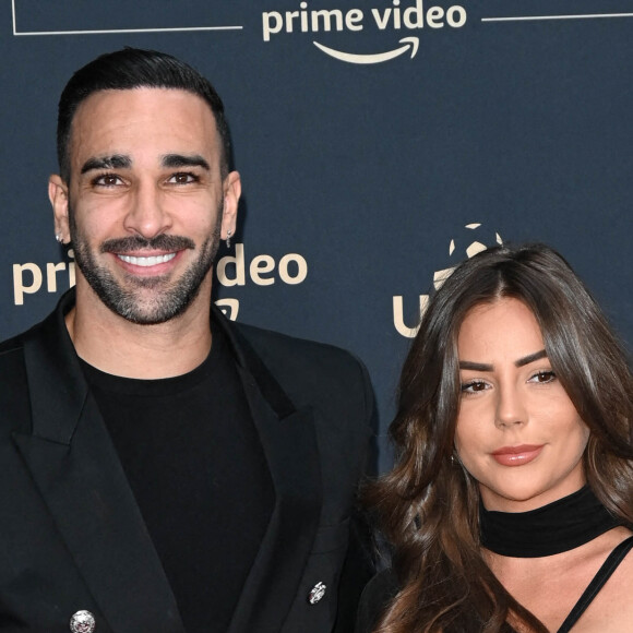 Adil Rami et sa compagne Léna Guillou - Photocall de la cérémonie des Trophées UNFP 2022 au Pavillon Gabriel à Paris le 15 mai 2022. © Coadic Guirec/Bestimage