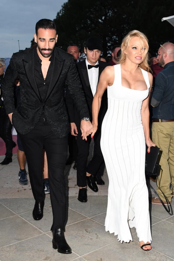 Pamela Anderson et son compagnon Adil Rami lors de la soirée Amber Lounge Monaco 2019 au profit de la fondation de Jackie Stewart "Race Against Dementia" à l'hôtel Méridien Beach Plaza à Monaco, le 24 mai 2019. 