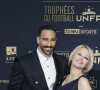 Adil Rami et sa compagne Pamela Anderson au photocall de la 28ème cérémonie des trophées UNFP (Union nationale des footballeurs professionnels) au Pavillon d'Armenonville à Paris, France, le 19 mai 2019. 