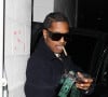 Exclusif - Rihanna et son compagnon A$AP Rocky, les mains pleines de son cognac "Mercer + Prince", quittent une soirée à Beverly Hills, le 19 décembre 2022. Asap Rocky s'est associé avec la marque canadienne de whisky.